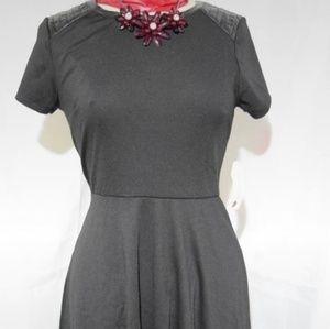 Black Dress with Leather Trim